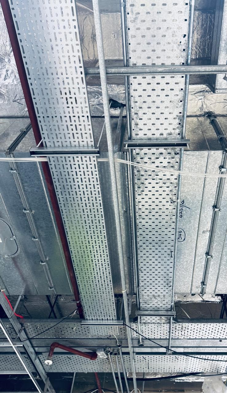 Electrical containment above a suspended ceiling