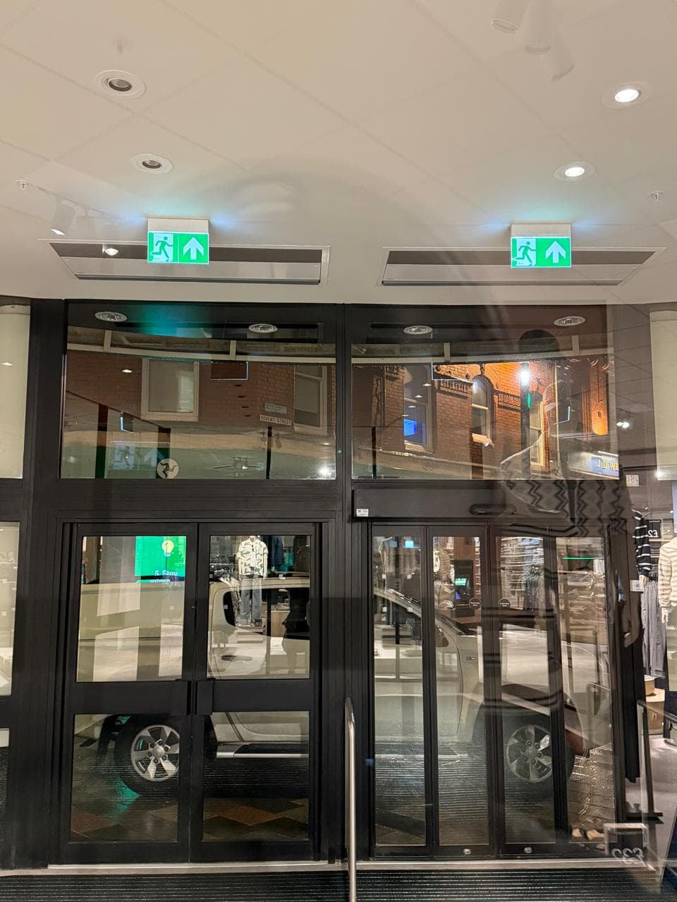 Emergency lighting installation at a commercial entrance